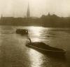 Photo of a Thames lighterman at work